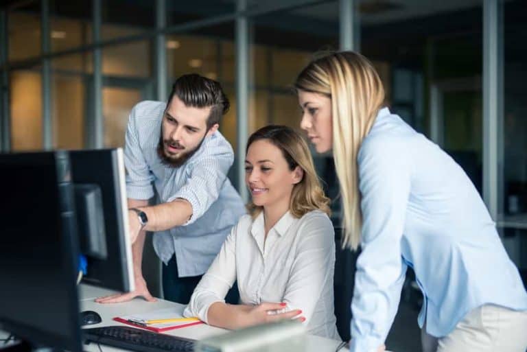 Employee Collaboration Around Computer